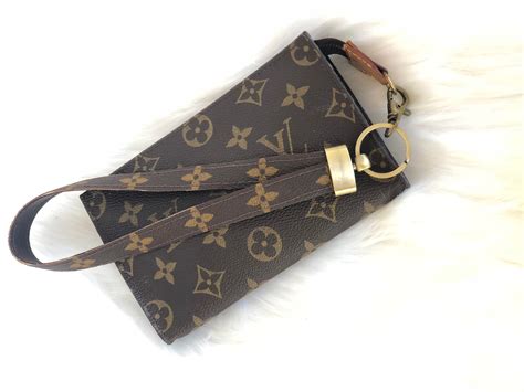 louis vuitton pouch with wrist strap|louis vuitton pouch on strap.